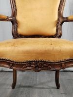Fauteuil en noyer à dossier cabriolet mouluré sculpté de fle… (photo 3)