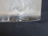 a close up of a glass of water on a table
