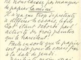 a handwritten letter written in black ink on a piece of paper