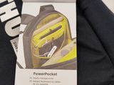 a black bag with a yellow and black bag attached to it
