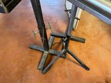 an image of a table with a metal stand on it