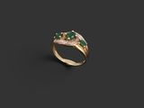 a gold ring with emerald and diamonds