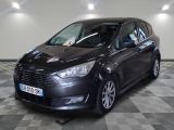 a picture of a black car parked on a checkered floor