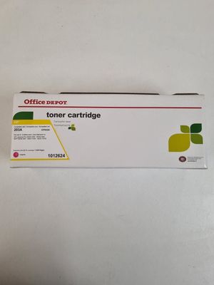 une cartouche de toner jaune sur une surface blanche