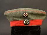 an image of a military hat with buttons on it