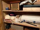 a closet with a lot of items in it