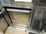 a stainless steel oven with a glass door in a kitchen