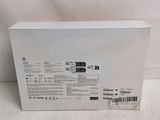 the back of a white box with a black label on it