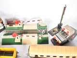 many different types of toy trains on a white surface