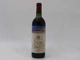 a bottle of wine that is sitting on a table