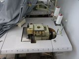 a sewing machine that is sitting on a table