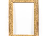a gold picture frame on a white background