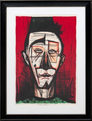 une image représentant un tableau représentant le visage d'un homme sur fond rouge
