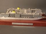 a model of a cruise ship on display on a table