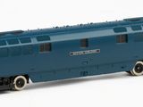 a blue and yellow train engine on a white background