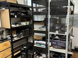 a room with a lot of shelves and a lot of drawers