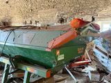 a boat that is sitting on a stand in a building