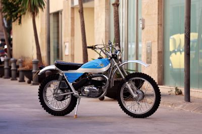 a motorcycle that is parked on the side of the street