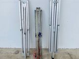 three skis that are leaning up against a wall