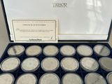 an image of a box of silver coins sitting on top of a table