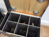 an open trunk that has a bunch of items inside of it