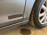 a sticker that says vapour on the side of a car