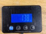 a digital clock that is on a table