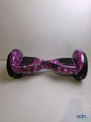 a purple hoveboard that is sitting on a table