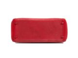 red leather pencil case on a white background