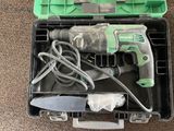 a box with tools in it sitting on the floor