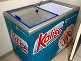 an ice cream machine that is sitting in the corner of the room