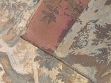 a close up of a piece of fabric with a bird on it