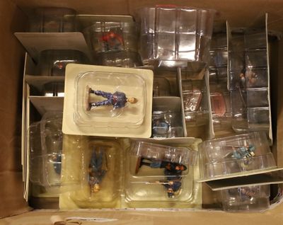 a box full of plastic toys that are in a box