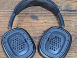 a pair of headphones sitting on a wooden table