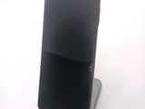 a cell phone that is sitting on top of a stand