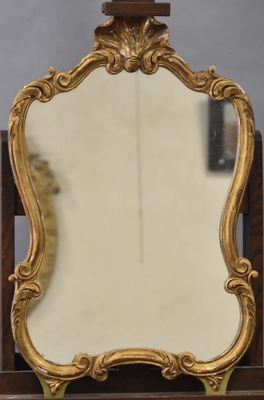 a mirror that is sitting on top of a table