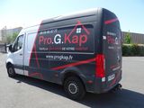 a van that is parked in a parking lot