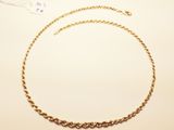 gold plated necklace with a chain that has a small bead on it