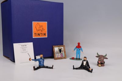 toy figurines of a man in a tuxedo, a cow, a man in a tuxedo, a man in a tuxedo,