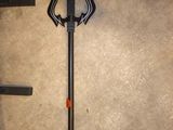a sword that is laying on the floor next to a key
