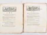 an old book with a picture of a man and a woman on it
