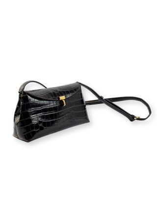 un sac à main en cuir de crocodile noir avec un fermoir doré