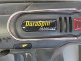 a close up of a cordless drill with a duraspin logo on it