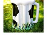 a picture of a picture of a cow mug on the internet