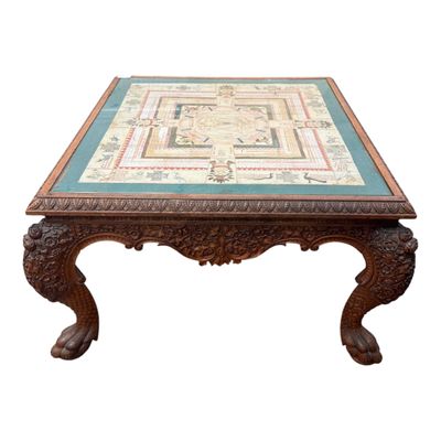 une photo d'une table basse avec un plateau en carrelage
