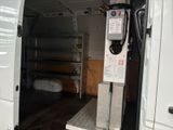 a white van that is parked in a garage