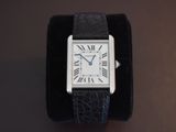 an image of a wrist watch with roman numerals on it
