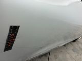 a close up of a car with a sticker on it