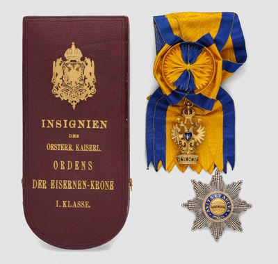 an image of a book with a medal and a medal on it