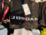 a lot of t - shirts that are on a table